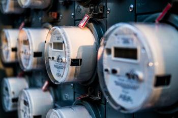 close up of rows of electric meters