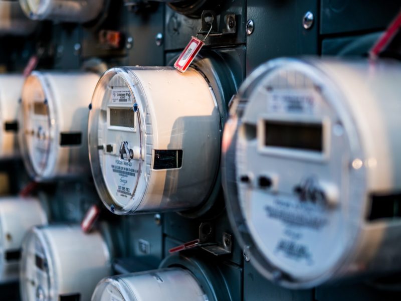 close up of rows of electric meters