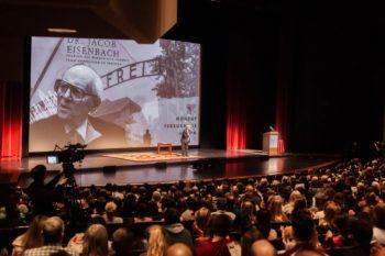Holocaust survivor Dr. Jacob Eisenbach speaking to a Texas A&M audience