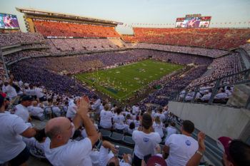 wide view of kyle field showing fans wearing red white and blue shirts