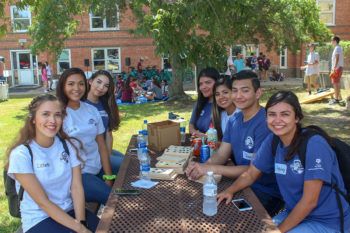first gen aggies sitting together at a table during first gen week