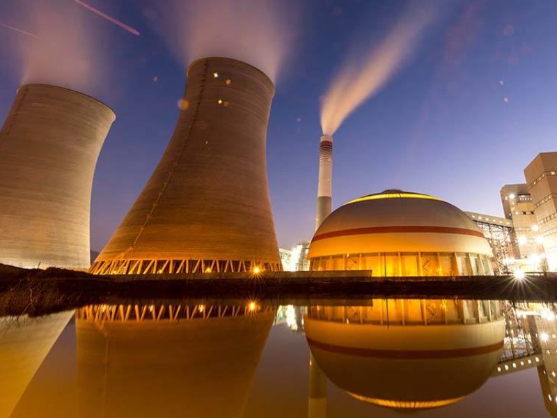 exterior of a nuclear plant at night