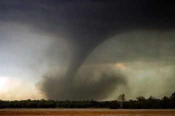 a tornado touches down in a field