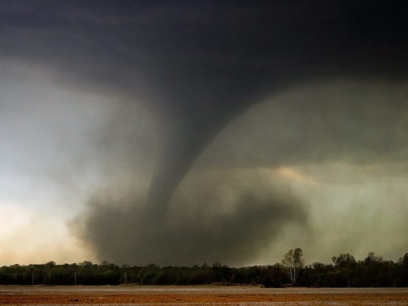 a tornado touches down in a field