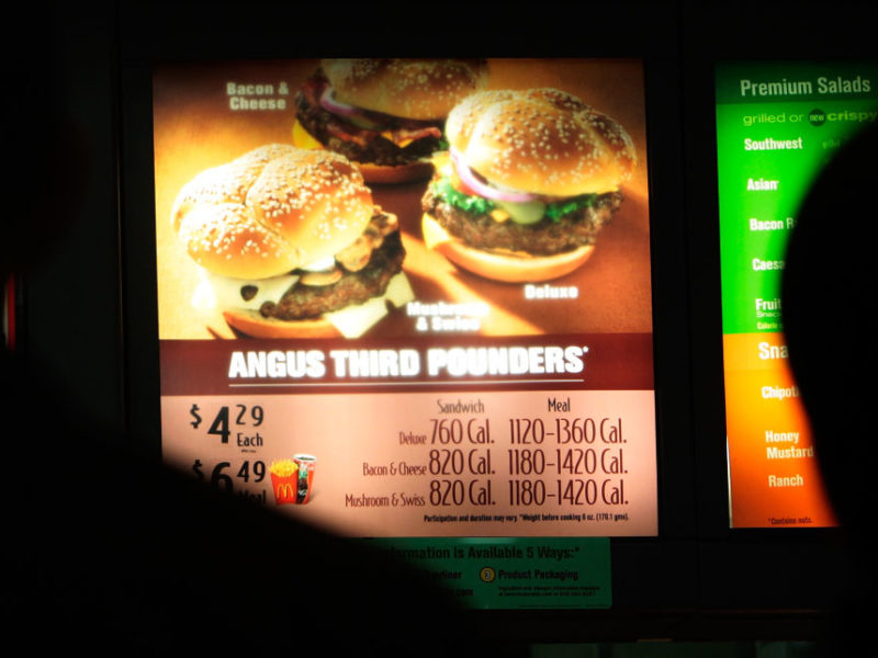 calories are listed next to food items on a mcdonald's menu