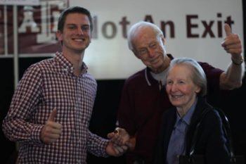 Lane Stephenson with wife Mickie handing their grandson Tyler Stephenson '18 his Aggie ring on Ring Day in April 2017