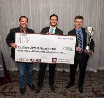 aggie PITCH winners posing with an oversized check