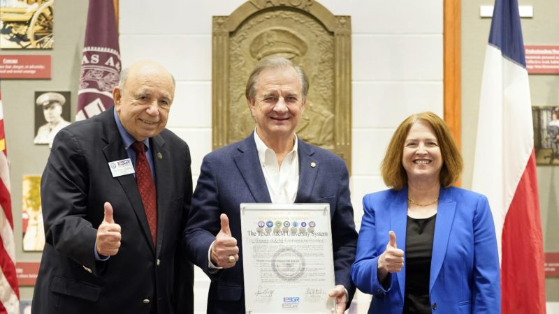 Photo of Texas A&M President Banks and others at the ESGR signing ceremony