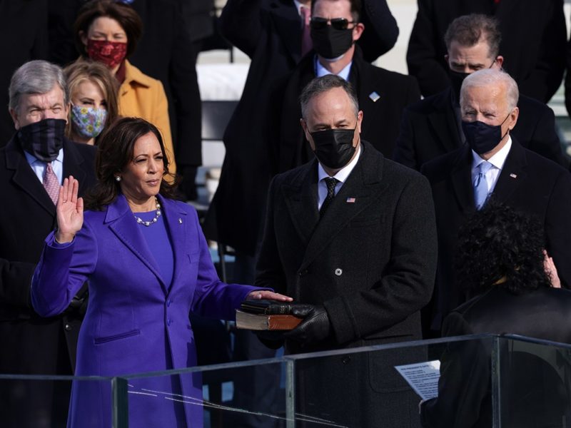 Kamala Harris is sworn in as U.S. Vice President as her husband Doug Emhoff looks on