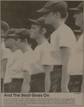a newspaper clip showing a photo of three female cadets at Aggie Band rehearsal