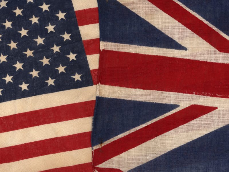 a photo of cloth US and UK flags next to one another