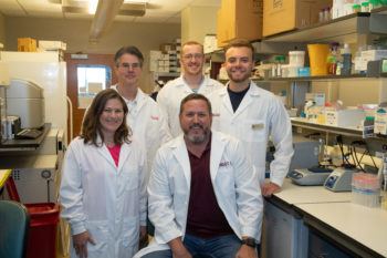 The Dindot Lab team, including Dr. Scott Dindot (front right); Dr. Sarah Christian (front left); (back row l-r) Dr. Johnathan Ballard, Texas A&M Institute for Genomic Medicine; and biomedical sciences doctoral students Luke Myers and Tom Jepp.