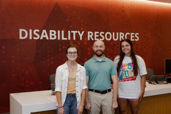Justin Romack, assistant director for Disability Resources, with his student employees Haley Jouett '23 (left), and Sarah Huggins '24