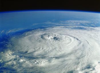 a photo of the earth's surface from space, showing a large hurricane in the Gulf of Mexico
