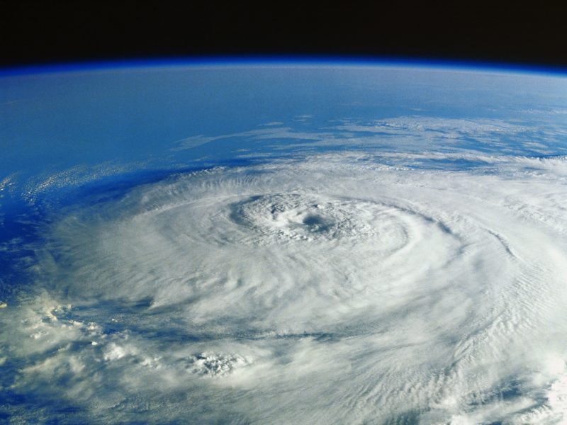 a photo of the earth's surface from space, showing a large hurricane in the Gulf of Mexico