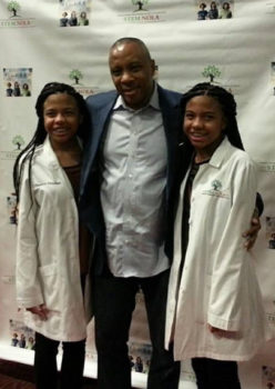 The Mitchell twins and Dr. Calvin Mackie, founder of STEM NOLA