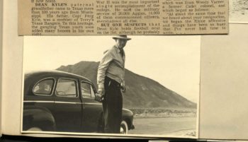 a photo of a scrapbook showing the bottom of a news clipping overlapping with a black and white photo of a man in a wide-brimmed hat in front of a black car