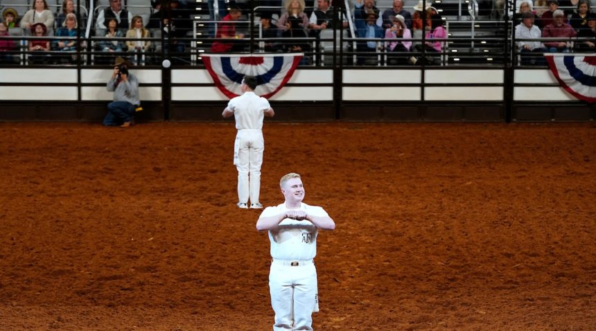 Texas A&M Yell Leaders at the rodeo