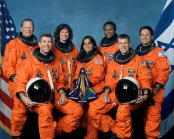 Group photo of the Columbia shuttle astronauts in their space suits