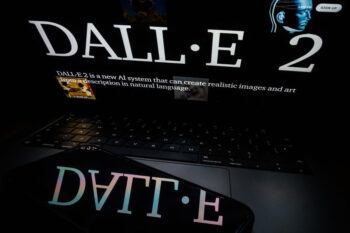 Photo illustration of the logo to Dall-E AI is open on a laptop screen