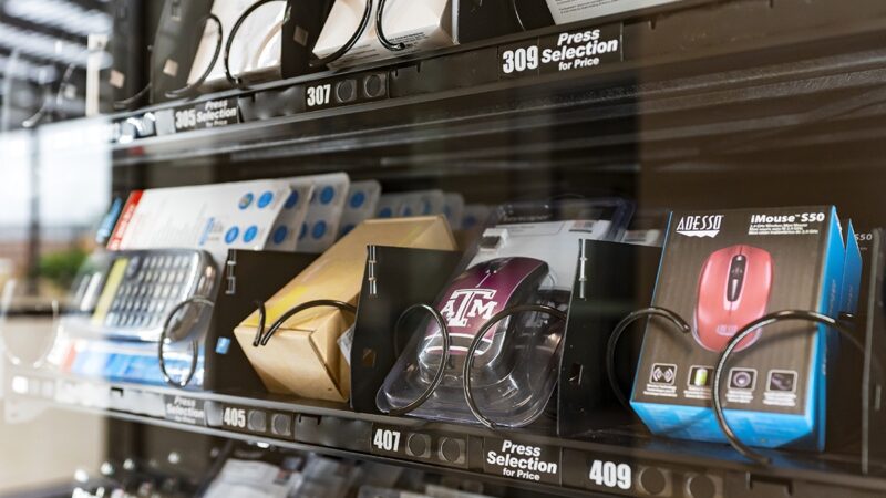 The 12th Man Technology vending machine in Zachry showing an A&M-themed computer mouse inside