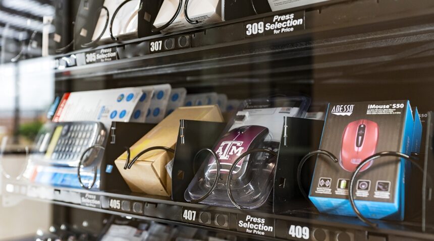 The 12th Man Technology vending machine in Zachry showing an A&M-themed computer mouse inside