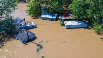 a photo of several structures submerged in floodwaters after Hurricane Harvey