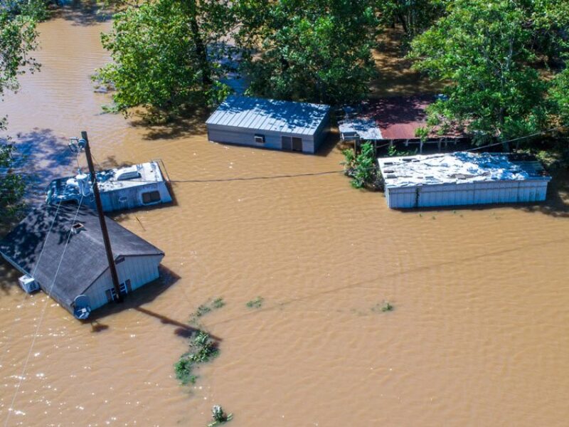 a photo of several structures submerged in floodwaters after Hurricane Harvey