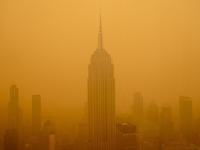 Smoky haze from wildfires in Canada diminishes the visibility of the Empire State Building