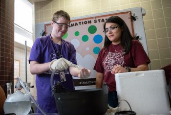 Jeanette Piña (right), demonstrating sublimation at the 2022 Chemistry Open House