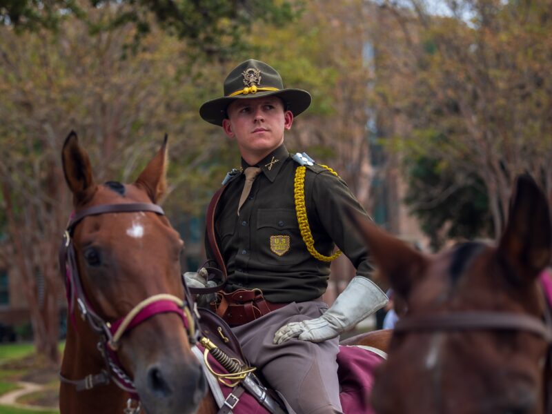 A photo of a Texas A&M student on horseback