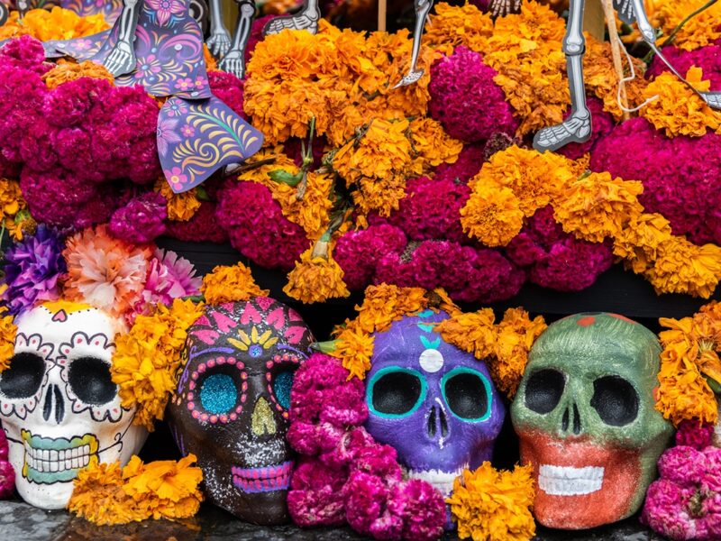 Aztec Marigold flowers - or cempasúchil - and skulls in Day of the Dead celebrations altar decorations - Mexico City, Mexico