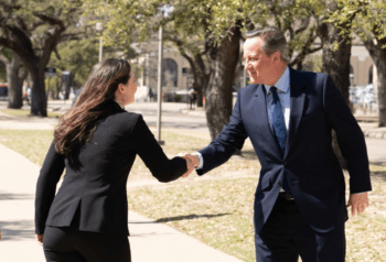 Former UK Prime Minister David Cameron shaking hands with a campus member during his April 2022 visit to campus to participate in the MSC Wiley Lecture Series