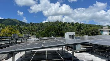 Rooftop solar panels were installed in Castañer as part of the project.