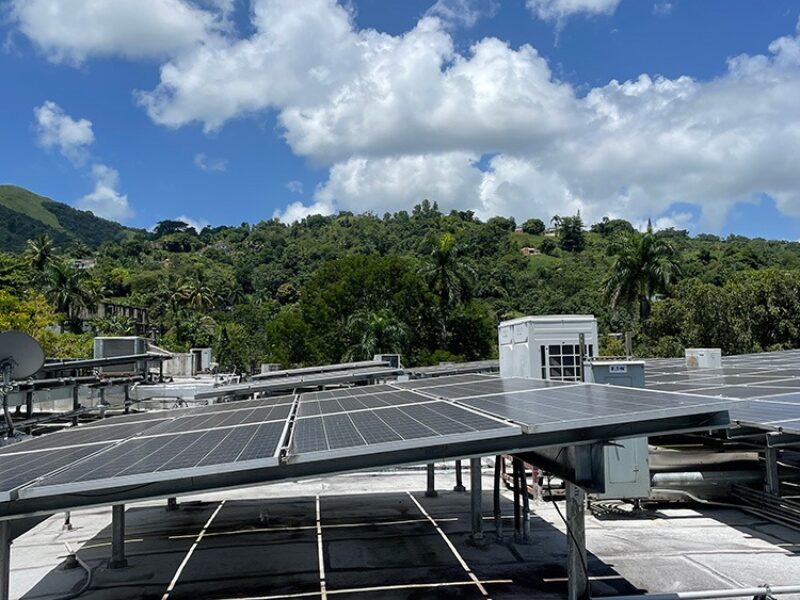 Rooftop solar panels were installed in Castañer as part of the project.
