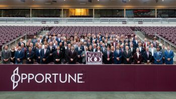 A group photo of representatives from this year's Aggie 100 businesses.