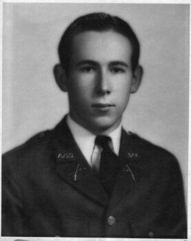 A black and white photograph of McIlroy as a student in his Corps of Cadets uniform