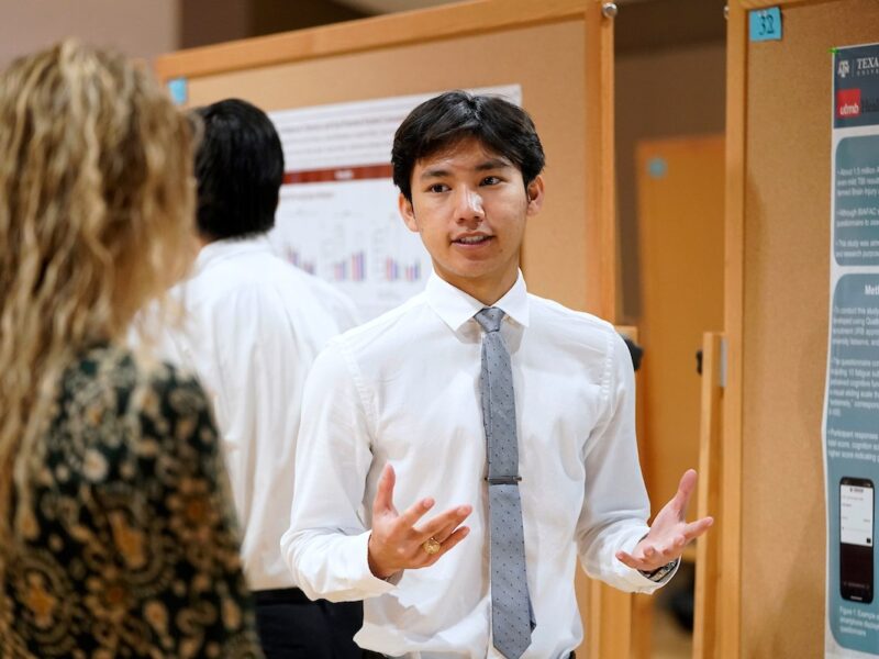 Alexander Huynh participates in the poster presentations during Student Research Week on March 22, 2022 at the Memorial Student Center at Texas A&M University
