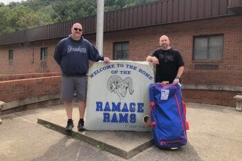 Brandon Burns (left) and Deron Godby (right) in front of Ramage Elementary.