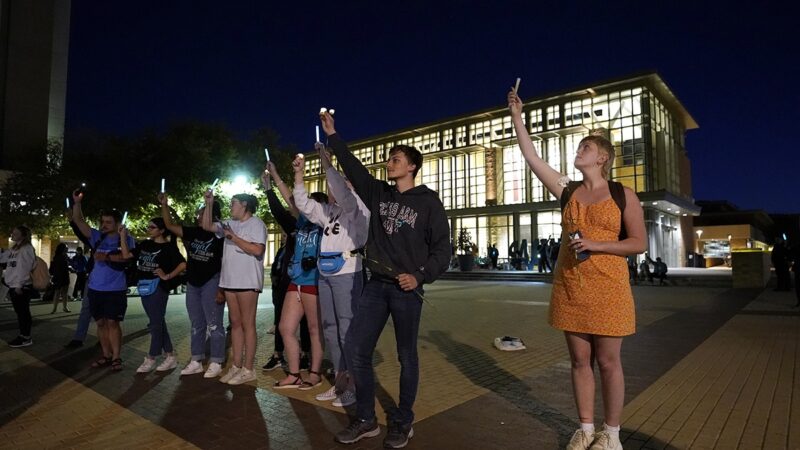 students gather in Rudder Plaza for Take Back the Night 2022