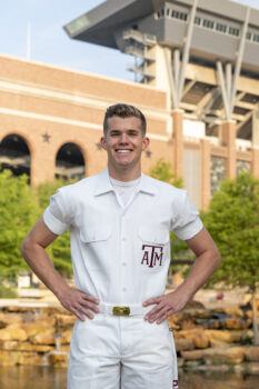 A yell leader poses for a portrait outside of Kyle Field on the Texas A&M University campus.