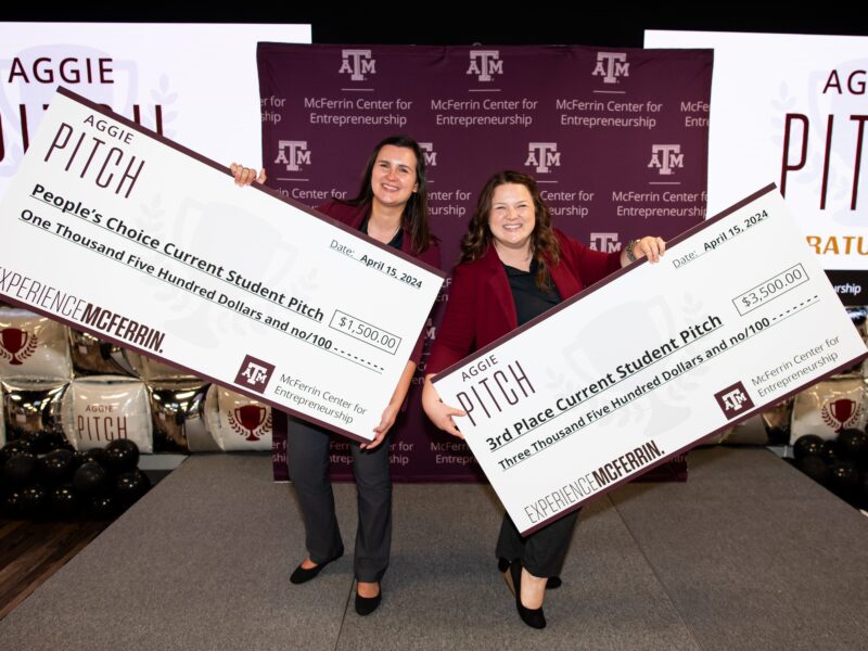 Cosmic Leap Foundation founders Rachelle Pedersen and Natasha Wilkerson with their prize checks from the Aggie PITCH competition.