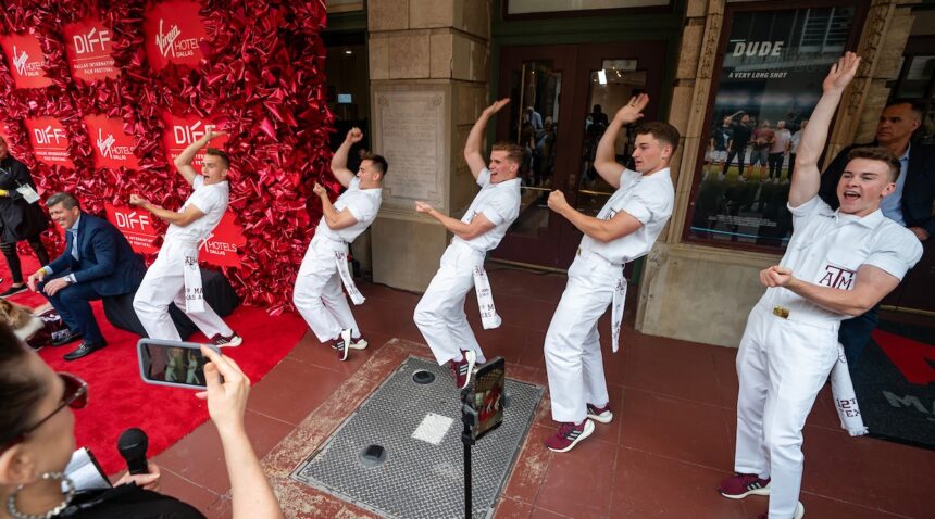 Yell Leaders performing an Aggie Yell on the DIFF red carpet