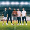 Dude Perfect posing at Texas A&M's Kyle Field
