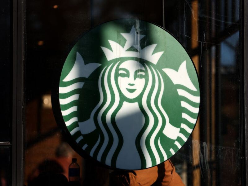The green Starbucks logo is seen outside of one of the chain's locations