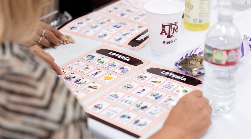 a participant at the Mental Health Fair playing a Loteria game