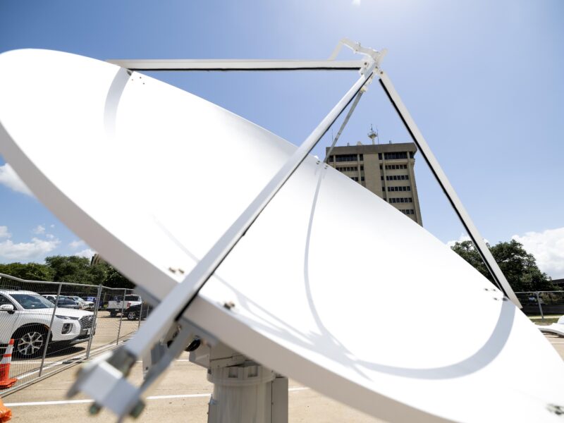 A weather radar sits in a parking lot outside the 0&M Building on the Texas A&M campus.