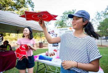 Two students playing a game at the Global Welcome Party last year