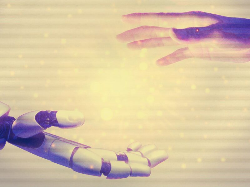 a rendering of a robot and human hand about to touch