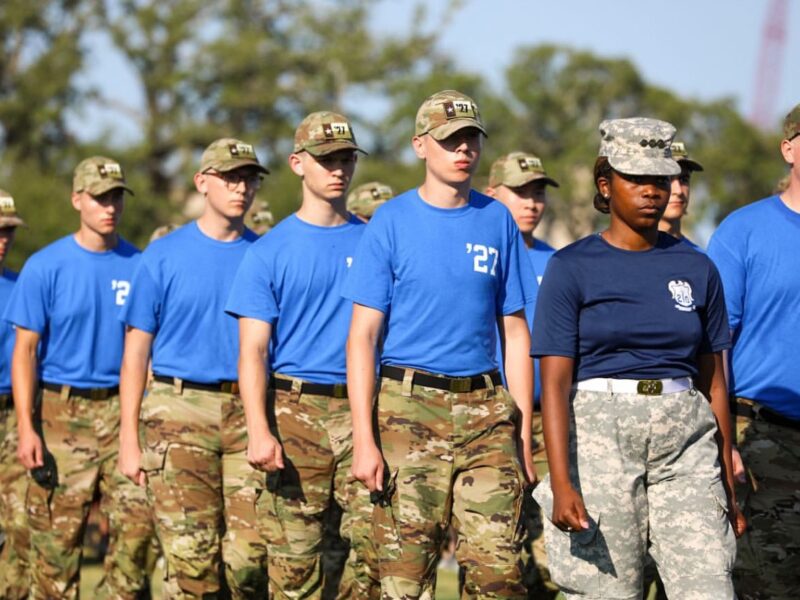 A photo of members of the Corps of Cadets marching in formation during orientation week prior to the start of the school year.